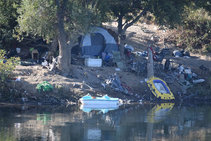 Sacramento Bans Homeless Camps Near River Levees Public Buildings